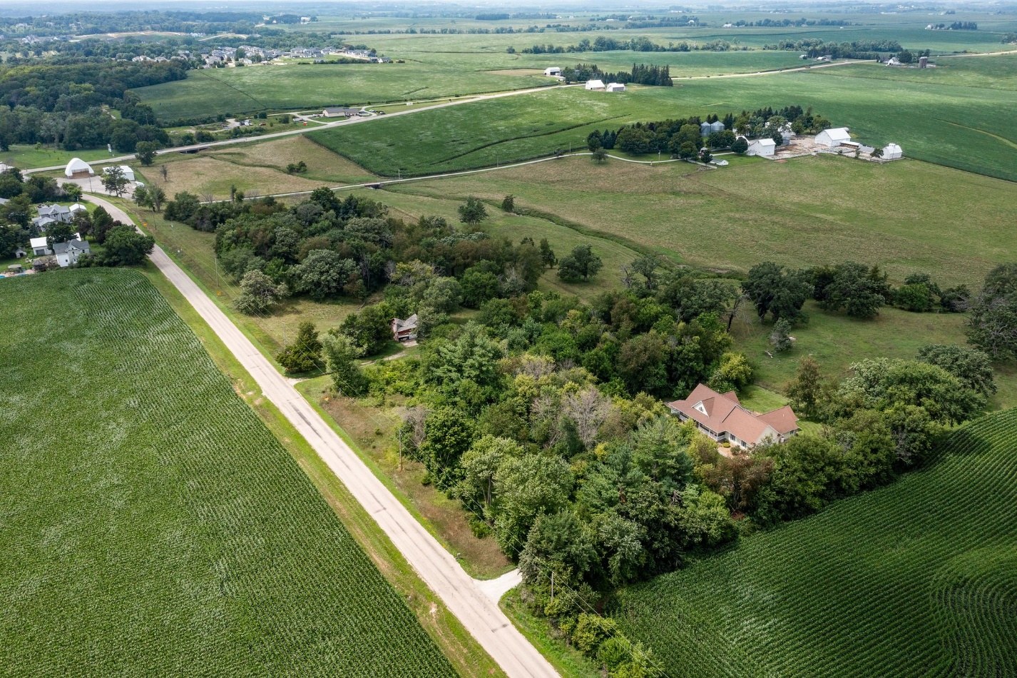 Aerial view toward Sutliff Road, open land, and surrounding farmland